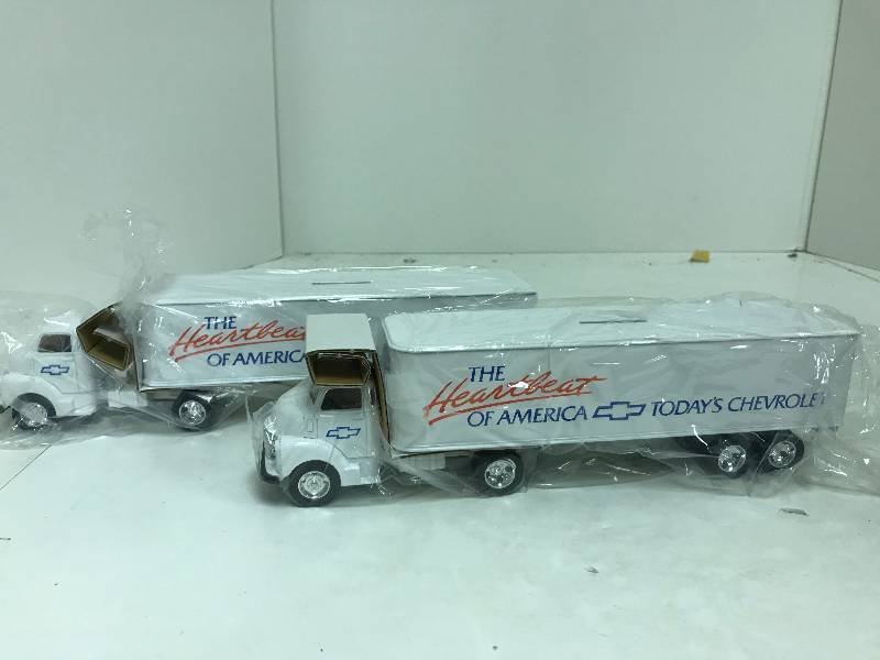 lot 1246 image: 2 each Ertl Semi, Chevrolet Heartbeat of America (Coin box), 164 scale, See Pix for detail, NIB