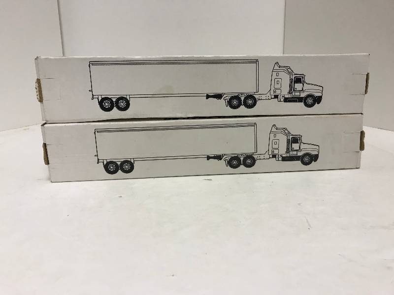 lot 1251 image: 2 Ertl Semi, Day and Night Semi, 9882, Jim Palmer Semi, 9939, 164 scale, See Pix for Detail, NIB