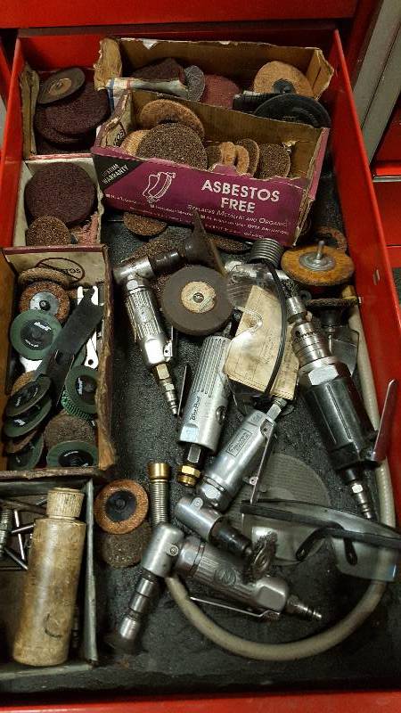 lot 1011 image: WOW this drawer has tons of pneumatic grinders angle and straight with a lifetime supply of discs.