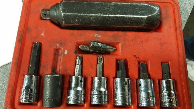lot 1016 image: Knock it loose with ease using this tool and bits included.