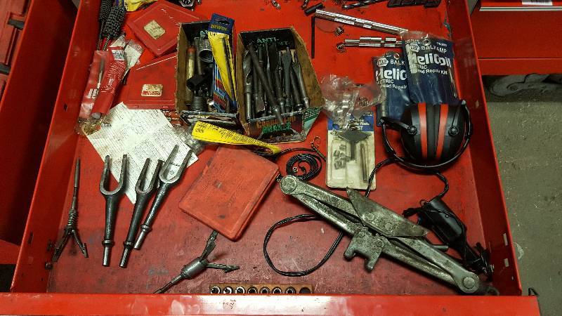 lot 1046 image: Great bunch of stuff in this miscellaneous tool drawer.  Muffler splicers ball joint separators, engraver, heli coil kit and air bits