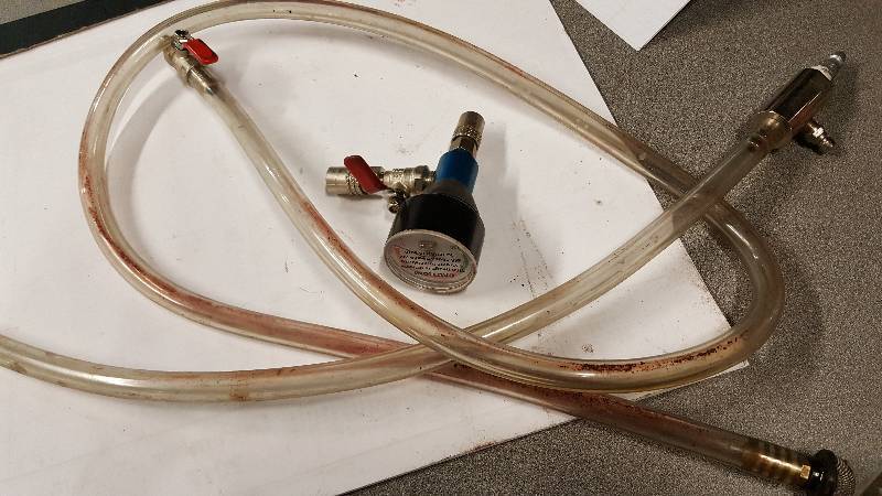 lot 1071 image: A must have for now a days cars and trucks is this cooling system air bleeder system