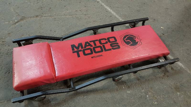 lot 1081 image: Hot Rod Matco Tools creeper.  Even has guard rails to keep you from falling off when you go to sleep