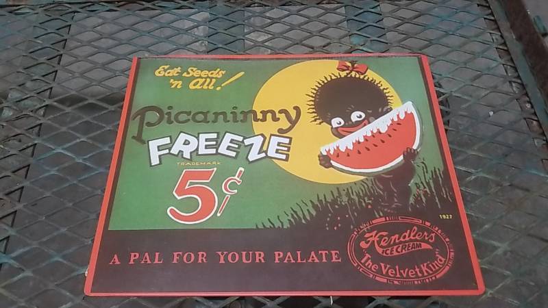 lot 4070 image: Picaninny Freeze- Tin.Metal Sign   Black Cartoon Eating Watermelon