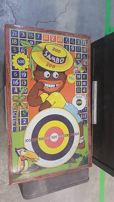 lot 4074 image: Vintage Sambo Negro Magnetic Dart Board- VERY COOL PIECE