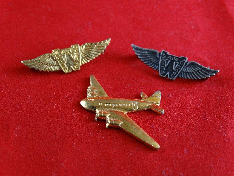 lot 2189 image: Vintage Pins Uniform-  Air Capital planes and Wings