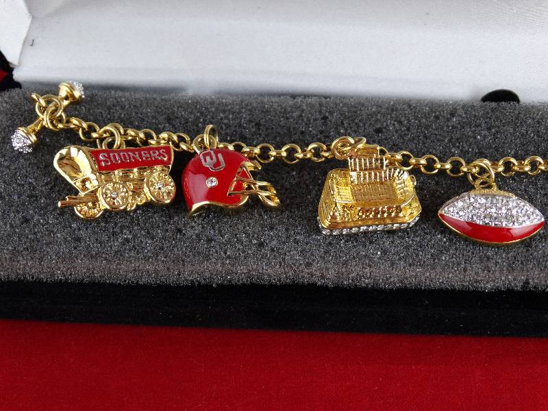 lot 2193 image: Danbury Mint- OU Oklahoma Sooner Charm Bracelet
