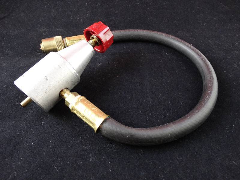 lot 2220 image: Coleman Propane Regulator- Appears NEW