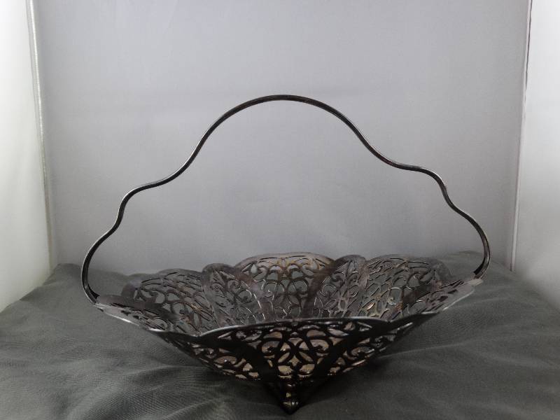 lot 2226 image: Carnival Style basket with feet Candy Dish or   International Silver Company
