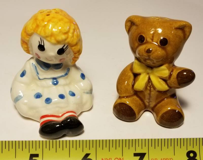 lot 19 image: Vintage Raggedy Ann with teddy bear Salt & Pepper shakers. Avon.
