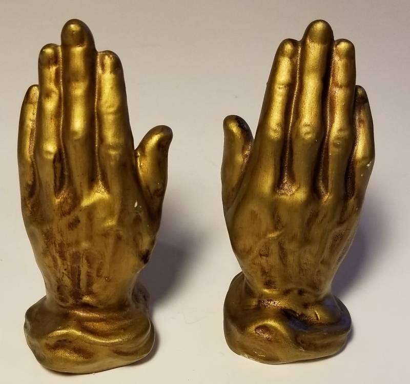 lot 13 image: Enesco Gold color praying hands Salt & Pepper shakers