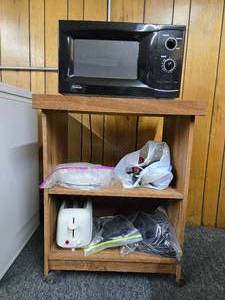 lot 24602 image: Sunbeam Microwave with Rolling Cart & Contents