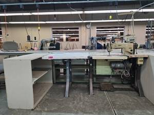 lot 13028 image: Commercial Singer Sewing Station