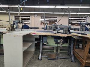 lot 13029 image: Commercial Singer Sewing Station