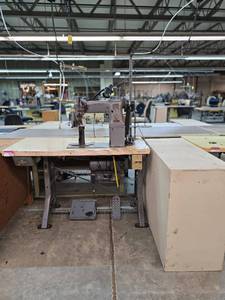 lot 13040 image: Commercial Singer Sewing Station