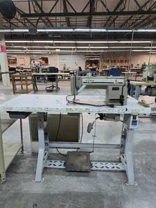 lot 13003 image: Commercial Singer Sewing Station
