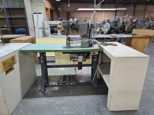 lot 13009 image: Commercial Singer Sewing Station