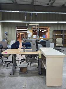 lot 13012 image: Commercial Singer Sewing Station