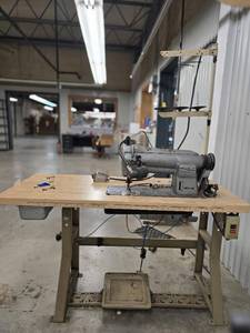 lot 17762 image: Commercial Singer Sewing Station