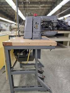 lot 17764 image: Commercial Singer Sewing Station