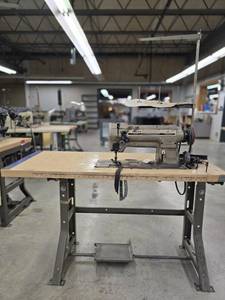lot 17768 image: Commercial Singer Sewing Station