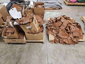 lot 14776 image: 2 pallets Of Brown Leather Scraps