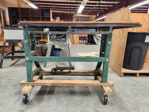lot 44027 image: Industrial Mobile Work Table with Steel Frame and Wooden Top. On Casters