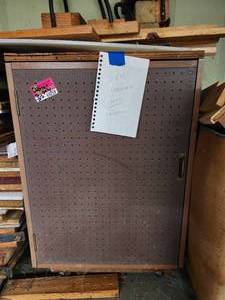 lot 44059 image: Industrial Wooden Storage Cabinet with Pegboard Door
