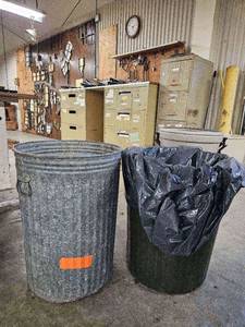 lot 14909 image: (2) Trash Cans. one is metal one is plastic