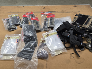 lot 16435 image: T.R.U. Ball Archery Release Aids and Arm Guards Lot - New Stock