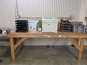 lot 45416 image: Wood Table with HP LaserJet P4014n Network Printer with Paper Trays