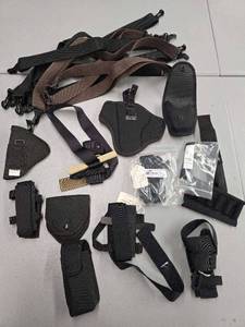 lot 11855 image: Black Nylon Holster System and Accessories