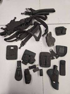 lot 11858 image: Black Nylon Holster System and Accessories