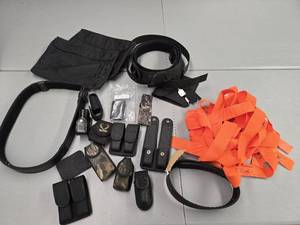 lot 11886 image: Black Nylon and Camo Gun Accessories