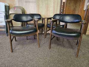 lot 24724 image: (4) Mid-Century Modern Walnut Arm Chairs with Black Vinyl Upholstery