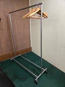 lot 42965 image: Rolling Garment Rack with Wooden Hangers