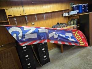 lot 48155 image: Large Promotional NOW HIRING Banner Flag with Patriotic Design