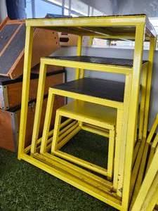 lot 21052 image: Metal Nesting Display Risers Set with Non-Slip Tops - Yellow
