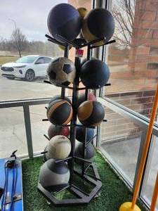 lot 21068 image: Multi-Sport Ball Storage Rack with Assorted Balls