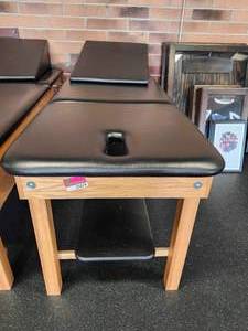 lot 21079 image: Tru Massage Table with Wooden Base and Black Upholstery