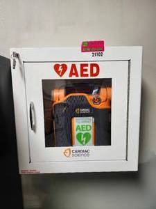 lot 21102 image: Cardiac Science Powerheart AED with Wall Cabinet