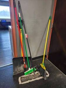 lot 21132 image: Commercial Cleaning Supply Set - Snow Shovel, Brooms, and Dust Mop
