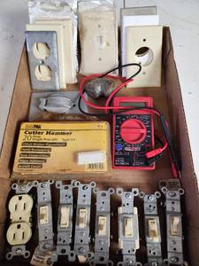 lot 352 image: Electrical Parts Lot - Cutler Hammer GFI, Switches, Outlets and Multimeter