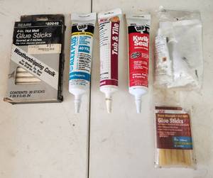 lot 404 image: Assorted Caulks and Glue Sticks