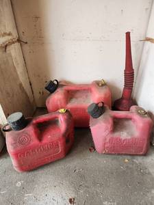 lot 411 image: Plastic Gas Cans with Funnel- Have some contents possibly 2 cycle