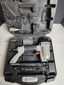 lot 455 image: Porter-Cable Finish Nailer with Case and Nails