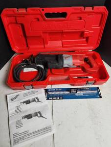 lot 456 image: Milwaukee Sawzall 6519 Reciprocating Saw with Case and Manual - Powers On