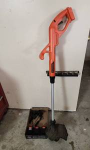 lot 490 image: BlackDecker Cordless Weed Eater with Batteries with Chargers (Powers On)