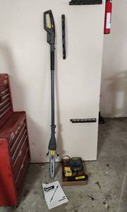 lot 491 image: Lynxx 40V Lithium Cordless Pole Saw with Battery and Charger (powers on)