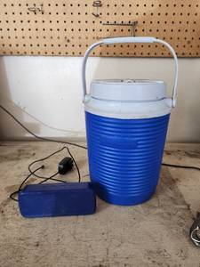lot 514 image: Insignia Portable Bluetooth Speaker NS-CSPBTHOL16 and Rubbermaid Water Cooler